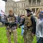 Armed demonstrators protest stay-at-home orders in Lansing, Michigan on May 14, 2020