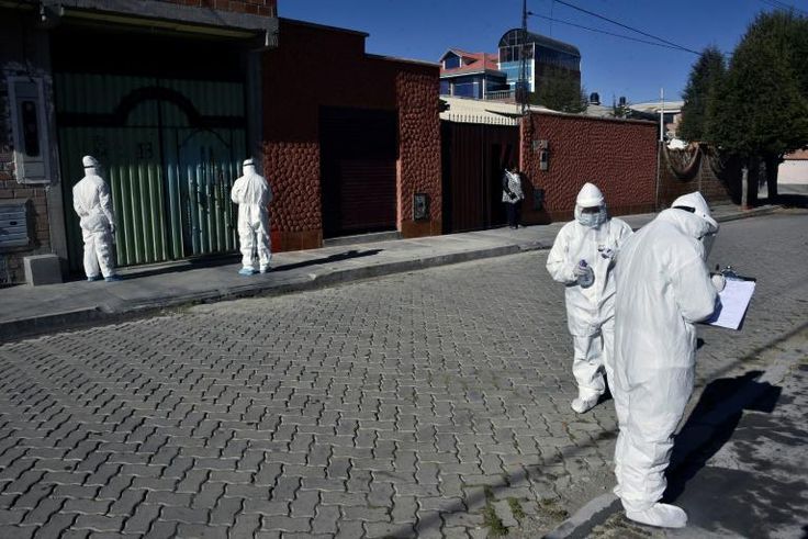 Health workers visit homes to check for possible COVID-19 cases in El Alto, Bolivia