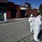 Health workers visit homes to check for possible COVID-19 cases in El Alto, Bolivia