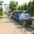 Empty food carts with chairs stacked on them sit in a lot next to a busy Bangkok highway -- the latest casualty of a deadly coronavirus which has stunted global travel and economies.