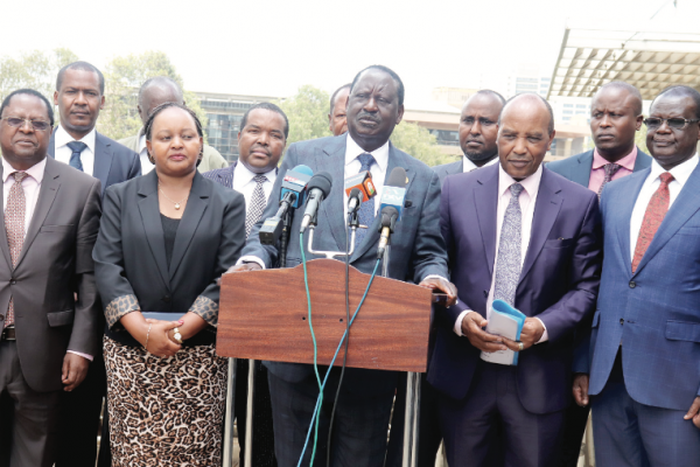 File image of ODM leader Raila Odinga with a section of Mt Kenya region governors and legislators address the press at his Capitol Hill office