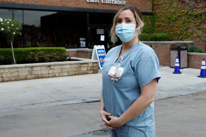 Nurse Nikki Hillis-Walters had two jobs -- one on either side of the US-Canada border