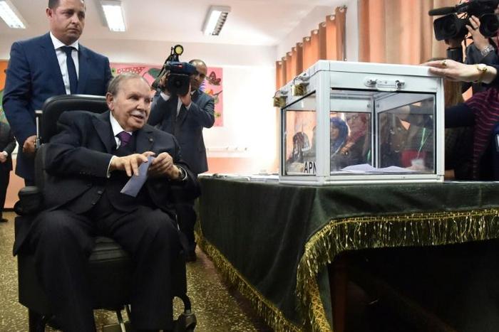Algerian President Abdelaziz Bouteflika casting his ballot during parliamentary elections in 2017