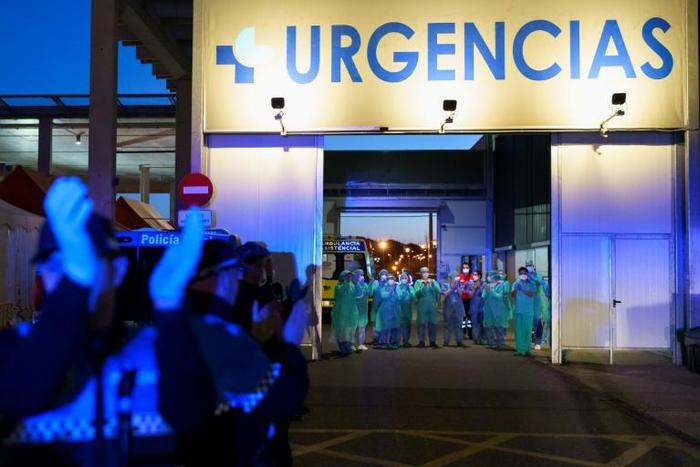 Many medical staff in Spain are close to breaking point because large numbers of them have fallen sick