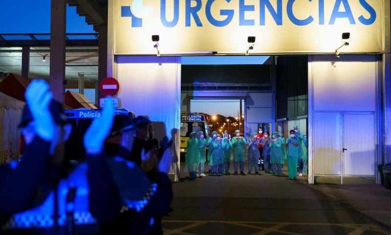 Many medical staff in Spain are close to breaking point because large numbers of them have fallen sick