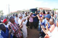 Mourners carry the remains of MP Dori during his burial on Monday. Minority Leader John Mbadi heckled after badmouthing DP Ruto at Suleiman Dori burial