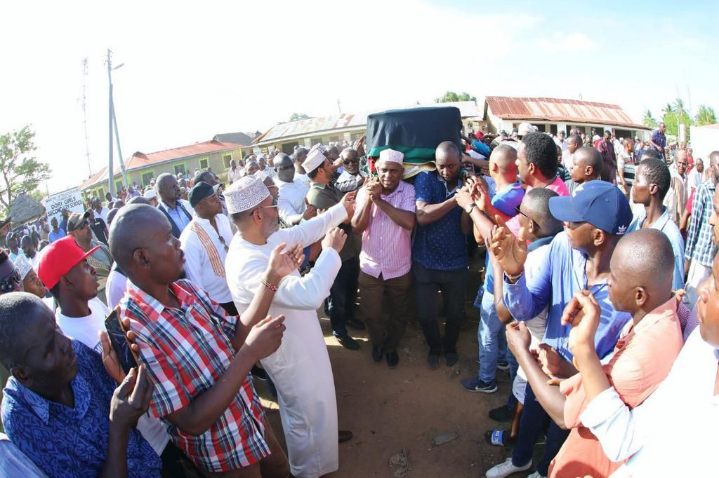 Mourners carry the remains of MP Dori during his burial on Monday. Minority Leader John Mbadi heckled after badmouthing DP Ruto at Suleiman Dori burial