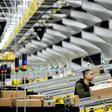 Amazon said it is implementing new safety measures including temperature checks for empoyees at warehouses as part of its efforts to contain the coronavirus pandemic