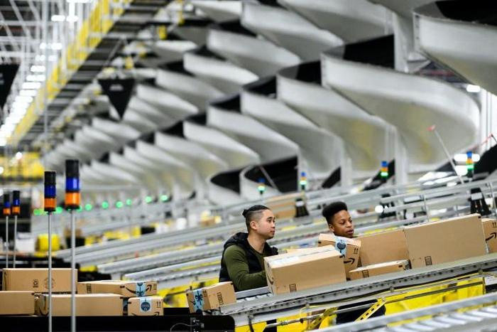 Amazon said it is implementing new safety measures including temperature checks for empoyees at warehouses as part of its efforts to contain the coronavirus pandemic