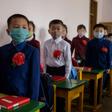 North Korean children wearing face masks against COVID-19 attend class on June 3, 2020 in Pyongyang, where Kim Jong-Un has praised the country's response to the virus