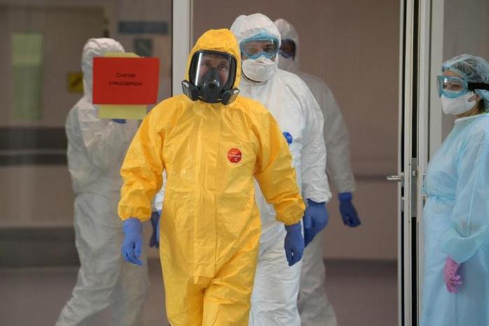 Putin used full protective gear during a visit last month to a hospital treating coronavirus patients