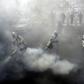 Firefighters disinfect streets in the Iranian capital Tehran in a bid to stem the spread of the coronavirus