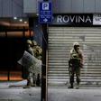 Lebanese troops take cover during overnight confrontations with protesters in the southern city of Sidon as anger over a spiralling economic crisis