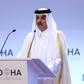 A file picture taken on December 14, 2019 shows the Emir of Qatar Sheikh Tamim bin Hamad al-Thani delivering a speech during the opening session of the Doha Forum in the Qatari capital