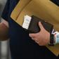 Governments are using various kinds of tracking such as these electronic bracelets in Hong Kong connected to an app to monitor people and curb the spread of COVID-19