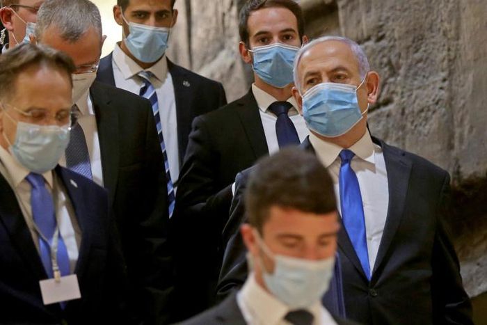 Israeli Prime Minister Benjamin Netanyahu arrives at the parliament building for the swearing-in of his new government last month