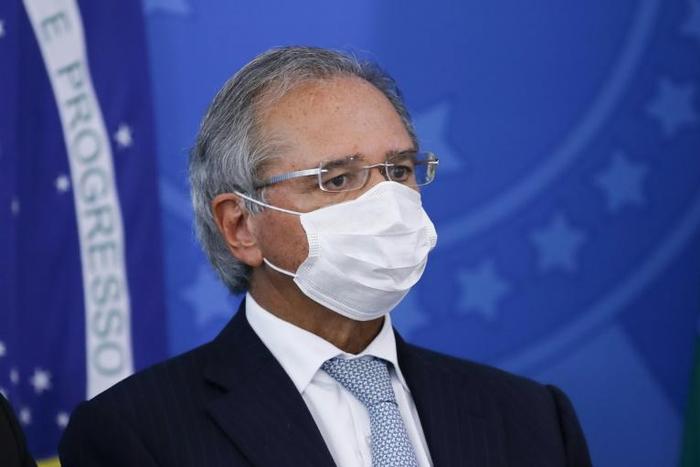 Brazil's Economy Minister Paulo Guedes -- seen here in March 2020 -- has warned of a possible "economic collapse" because of stay-at-home measures designed to curb the spread of the novel coronavirus
