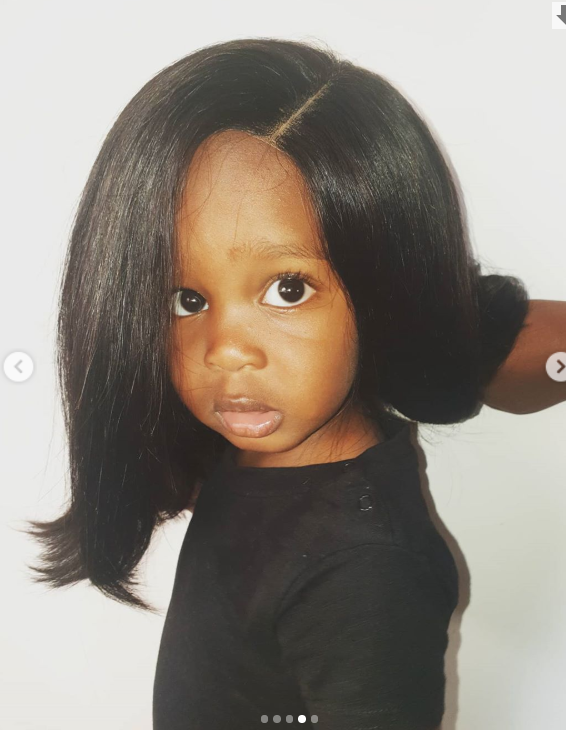 Njugush and Wakavinye's son in a wig (Instagram)
