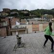 Some Italians have turned their roofs into improvised gyms and even tennis courts in an effort to avoid going stir crazy