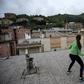 Some Italians have turned their roofs into improvised gyms and even tennis courts in an effort to avoid going stir crazy