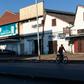 A lone cyclist makes his way in the usually bustling part of downtown Harare