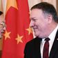 US Secretary of State Mike Pompeo and Chinese Politburo member Yang Jiechi shake hands following a meeting and press conference in Washington in November 2018