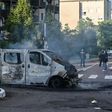 A burned-out van in the Gresilles neighbourhood of Dijon, eastern France, on Monday after a night of clashes.