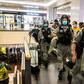 Small flashmob demonstrations broke out in at least eight malls, prompting riot police to rush in and disperse heckling crowds of activists and shoppers