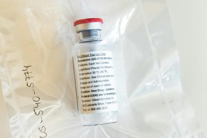 A vial of the drug Remdesivir is viewed during a press conference