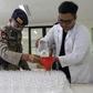 Staff at a Bali university have turned 4,000 litres of local palm wine into a hand sanitiser to protect residents of the holiday island against the coronavirus