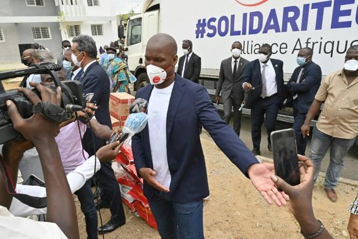 Didier Drogba speaks to media as he helps distribution of food and sanitary  products in Abidjan