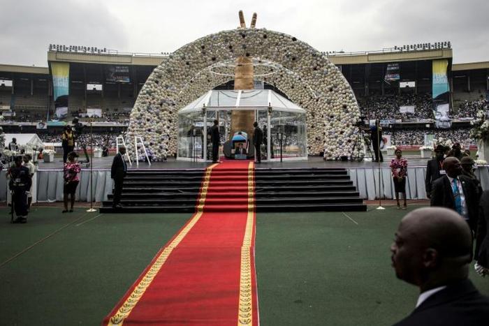Funerals are no small affair in DR Congo. Pictured: The coffin of former premier and opposition leader Etienne Tshisekedi, the father of President Felix Tshisekedi, at ceremonies last May