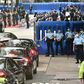 Guests drive past barriers near the Office for Safeguarding National Security of the Central People's Government in the Hong Kong Special Administrative Region after its official inauguration