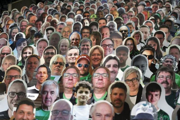Still life: Cardboard cutouts of fans at the Borussia Moenchengladbach v Bayer Leverkusen game