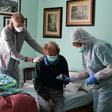 Sister Angel Bipendu (R) makes home visits within Zogno, a commune of 9,000 in the province of Bergamo, where the coronavirus has killed about 2,000 people