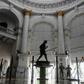A sweeper cleans the floor of the General Post Office in Kolkata after some lockdown restrictions were relaxed