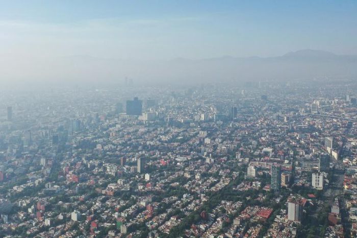 Air pollution in Mexico City. Global CO2 emissions need to drop 45 percent by 2030 and reach 'net zero' by 2050 to limit temperature rises at 1.5 degrees Celsius