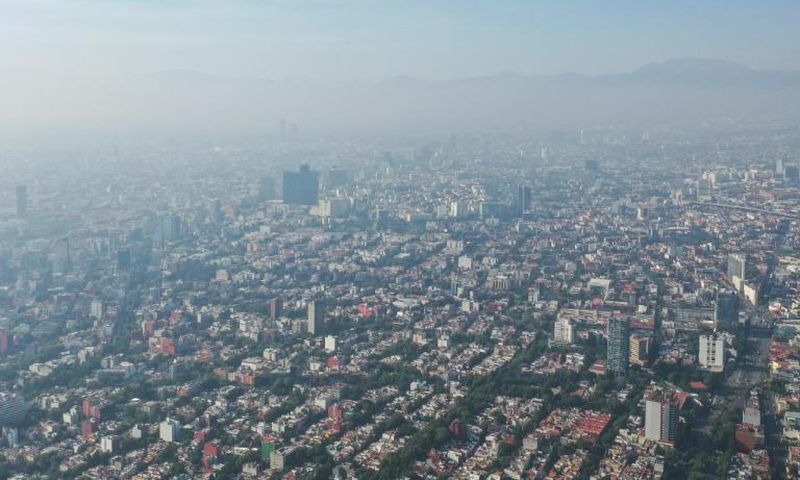 Air pollution in Mexico City. Global CO2 emissions need to drop 45 percent by 2030 and reach 'net zero' by 2050 to limit temperature rises at 1.5 degrees Celsius