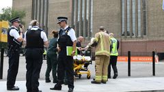 The fall left the young boy, who was visiting London with his family at the time of the attack, with a broken spine, legs and arms