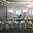 A nurse cares for newborn babies at Kiev's Venice hotel -- dozens born to surrogate mothers were stranded in Ukraine as their foreign parents were unable to collect them for weeks owing to coronavirus border closures