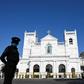 A policeman stands guard outside St. Anthony's church, which was hit by the 2019 Easter suicide bombers