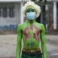 Masked: Performance artist Alex Kalemera tries to raise public awareness about the threat of coronavirus