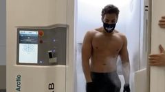 Joseph Baena Flexes After a Cryotherapy Session