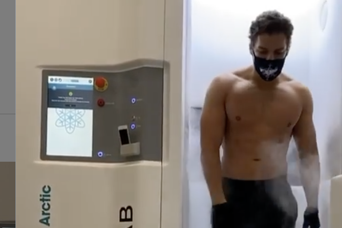 Joseph Baena Flexes After a Cryotherapy Session