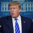 US President Donald Trump addresses reporters at the White House