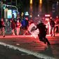 Police clash with protesters near the   National Assembly building in Belgrade, on July 10, 2020, at a demonstration against a weekend curfew announced to combat a resurgence of COVID-19 infections