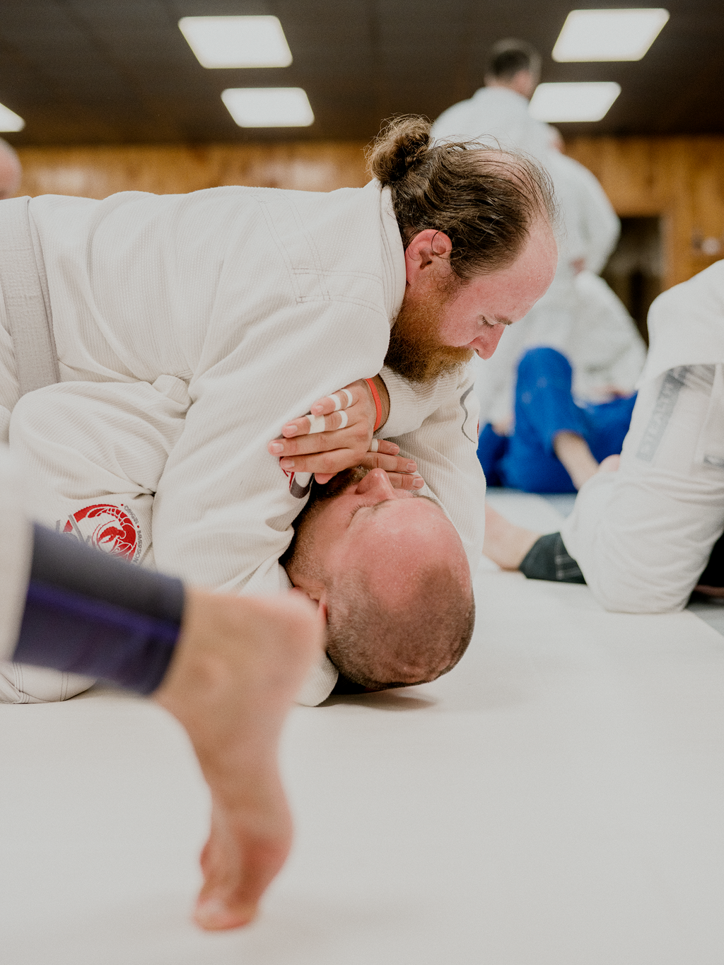 Author Michael J. Mooney grapples with a fellow camper.