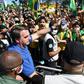 Brazilian President Jair Bolsonaro (C) has opposed lockdown measures