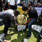 Thai activists unveil a replica of bronze plaque marking the anniversary of the 1932 revolution. The original mysteriously vanished in 2017