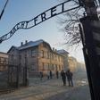 A file picture taken on December 5, 2019 shows the main gate at the entrance to the Nazi Auschwitz concentration and extermination camp in  Poland